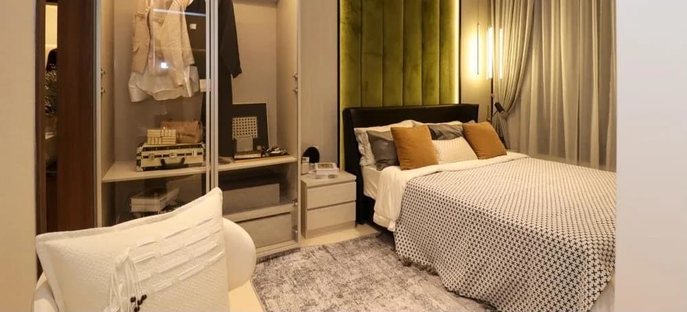 The Iconic by PGB Type A show unit — bedroom with walk-in wardrobe